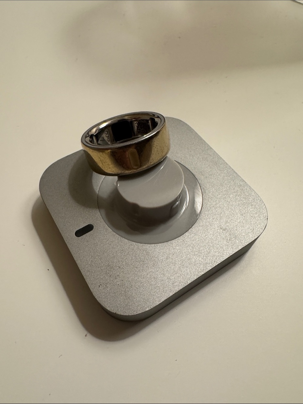 Oura Ring 4 size 7 and Charging Dock in Silver with Gold Ring